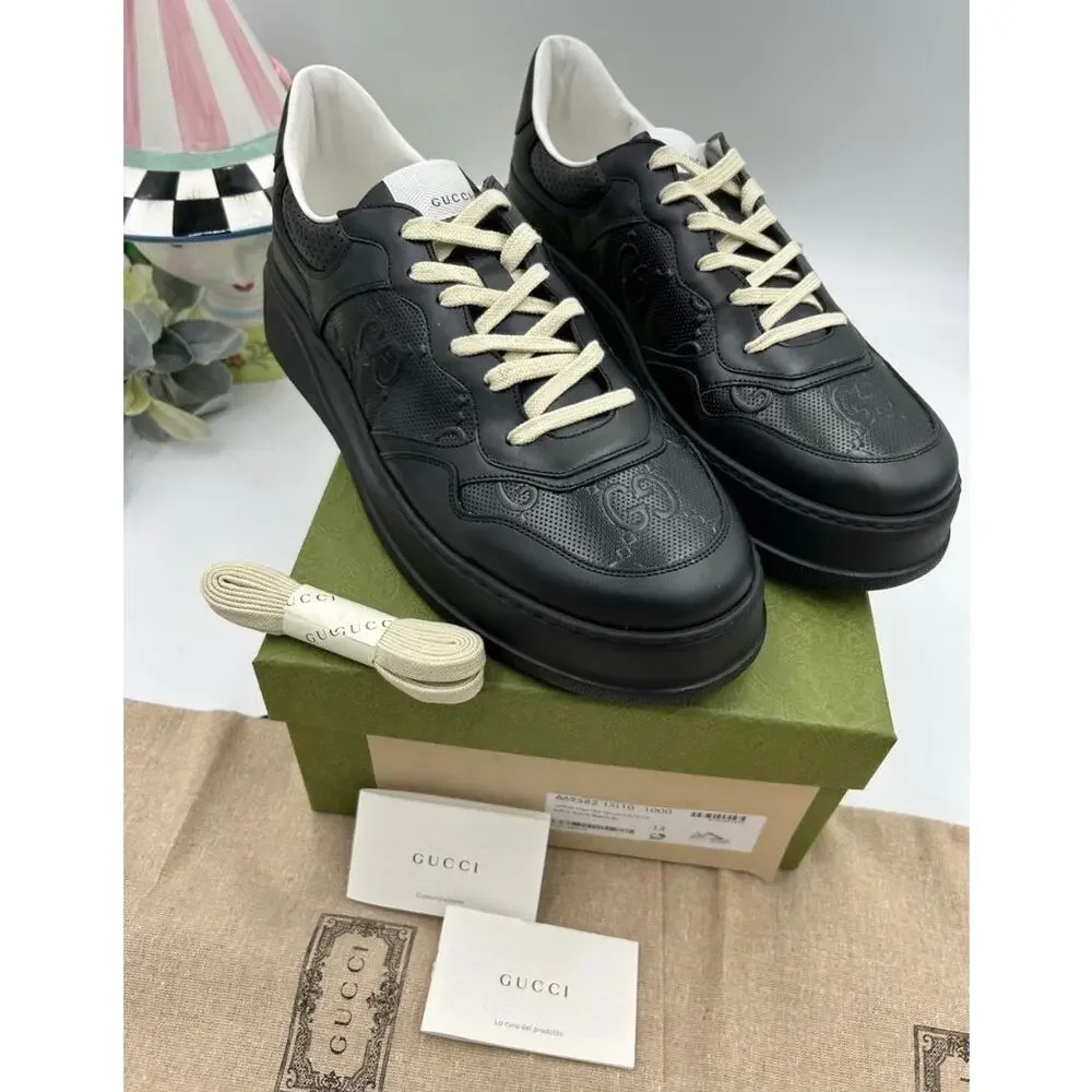Men's Gucci, GG embossed leather sneakers size 13 fits 13.5 US made in Italy